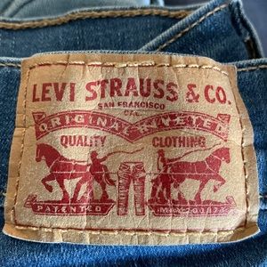 Levis 710 super Skinny Girls Size Reg 27x32 Stretch Medium Wash Jeans